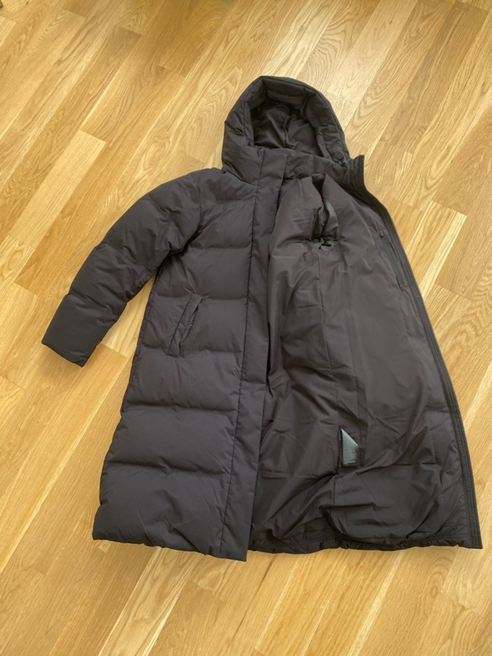 Uniqlo Women’s Black Parka in size XS (runs large). SUPER warm!!!